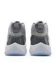Heels of the grade school kids Nike Air Jordan 11 cool grey basketball shoes in grey and white