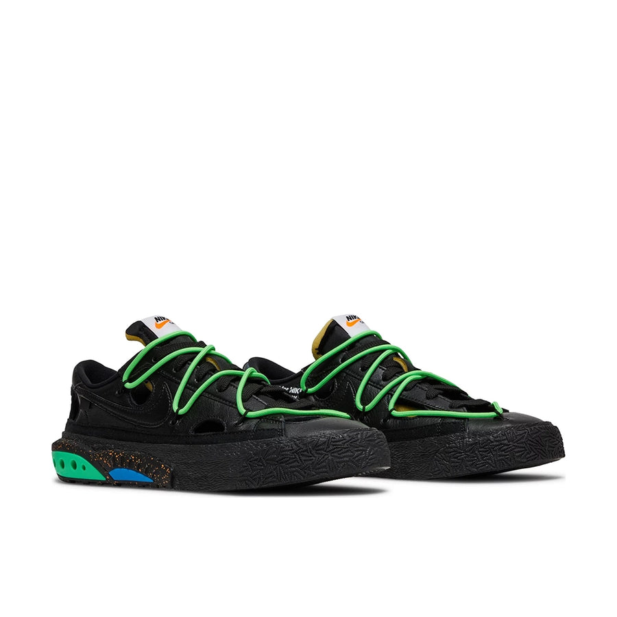 A pair of Nike Blazer Low Off-White Black Electro Green sneaker in black