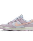 Side of the Nike dunk low womens shoes in pink and light purple colour