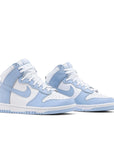 A pair of the womens Nike dunk high skating shoes in a white blue aluminium colour