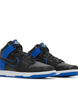 A pair of the Nike dunk high skating shoes in a black blue camo colour