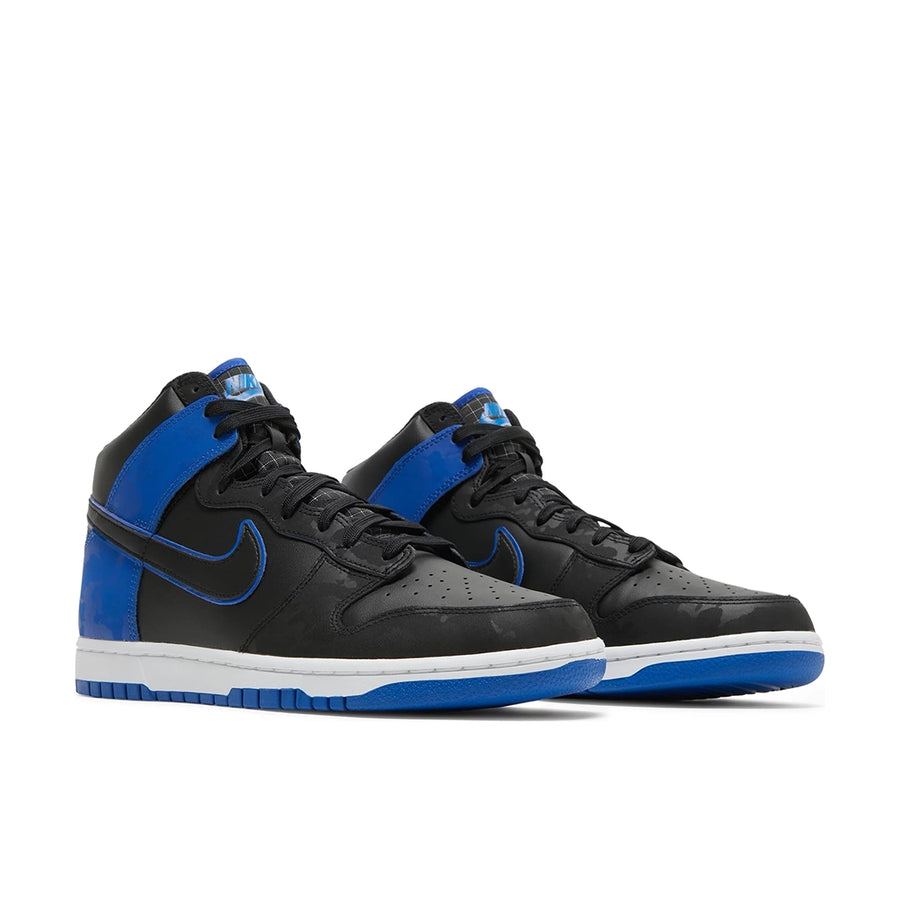 A pair of the Nike dunk high skating shoes in a black blue camo colour