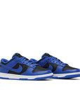 A pair of the Nike dunk low in a black hyper cobalt colour