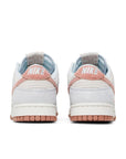 Heel of the Nike dunk low fossil rose skating shoes in rose and grey