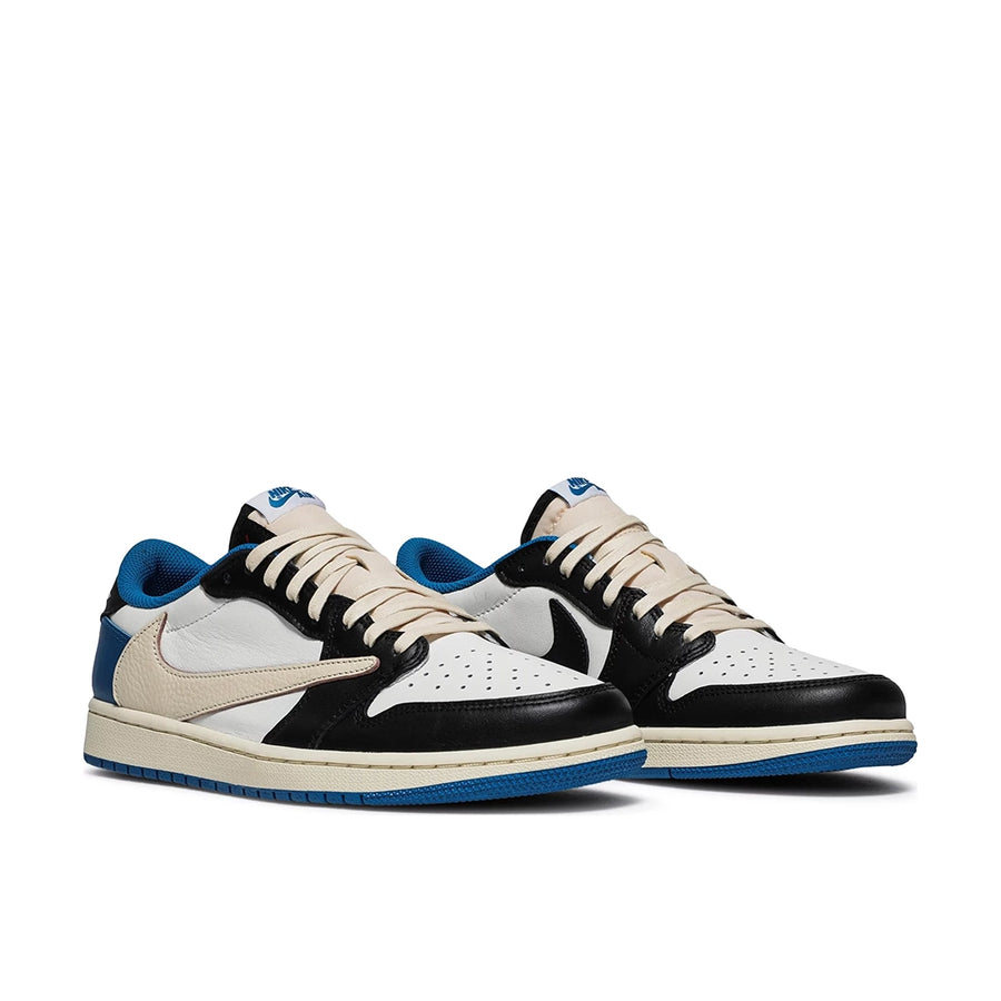 A pair of Nike Dunk Low Fragment x Travis Scott exclusive sneakers in white. black and blue
