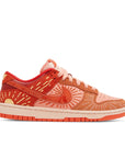 Side of the Nike Dunk Low NH Winter Solstice womens sneakers in orange and yellow