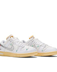 A pair of Nike Dunk Low Off White Lot 1 sneakers in white
