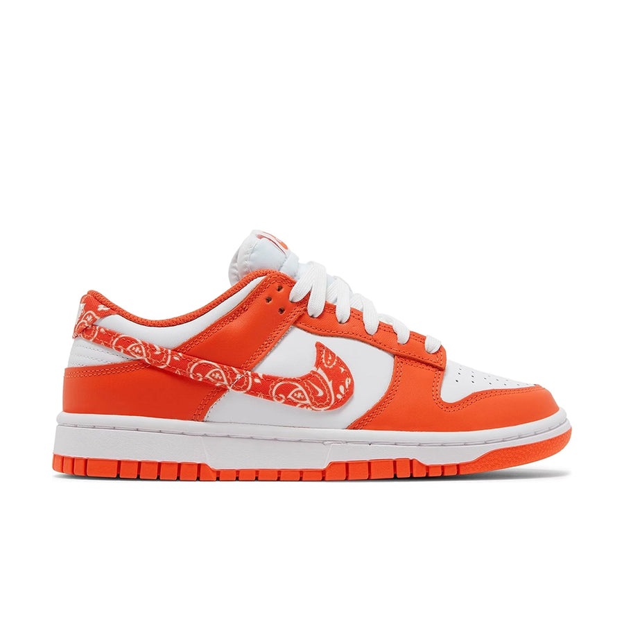 Side of the womens Nike dunk low in a white orange "orange paisley" colour
