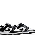 A pair of the  Nike  dunk low in a black white "Panda" colour