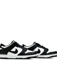 A pair of the  older kids version Nike  dunk low in a black white "Panda" colour