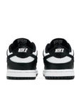 Heel of the baby version of the Nike dunk low in a black white "Panda" colour