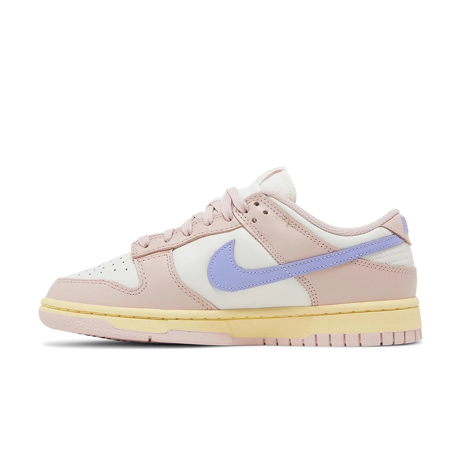 Side of the womens Nike dunk low in a pink lilac "pink oxford" colour