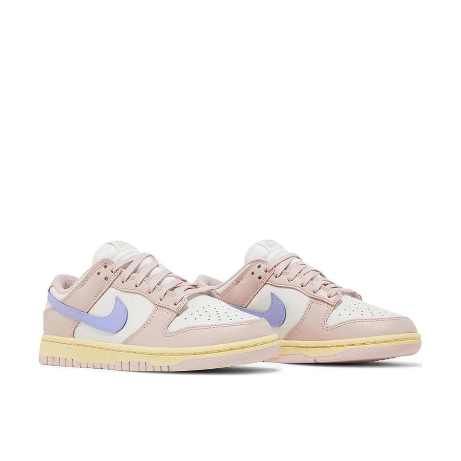 A pair of the womens Nike dunk lows in a pink lilac "pink oxford" colour