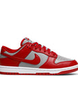 Side of the Nike dunk low retro in a grey red unlv colour