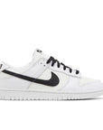 Side of the Nike Dunk Low Reverse Panda basketball shoes in white and black