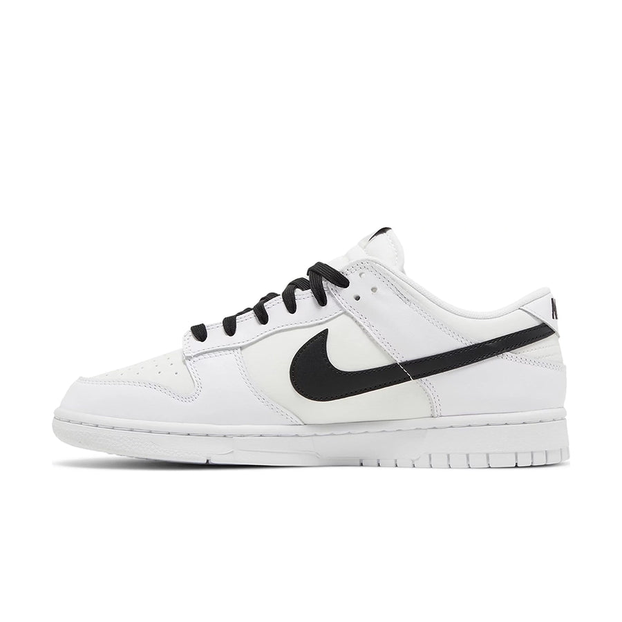 Side of the Nike Dunk Low Reverse Panda basketball shoes in white and black