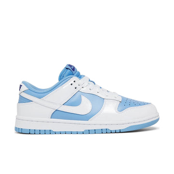 Side of the Nike Dunk Low Reverse UNC womens sneakers in white and blue