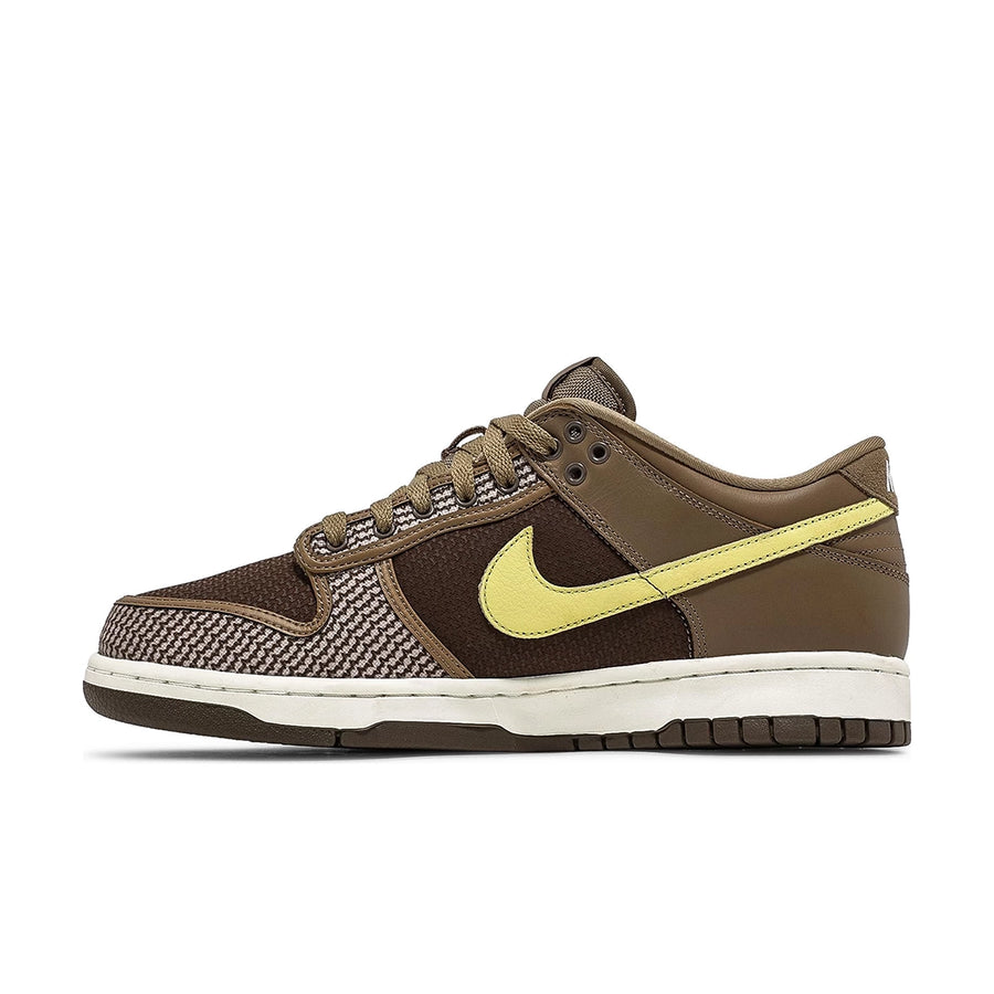 Side of the Nike dunk low sp undefeated canteen in brown and lemon
