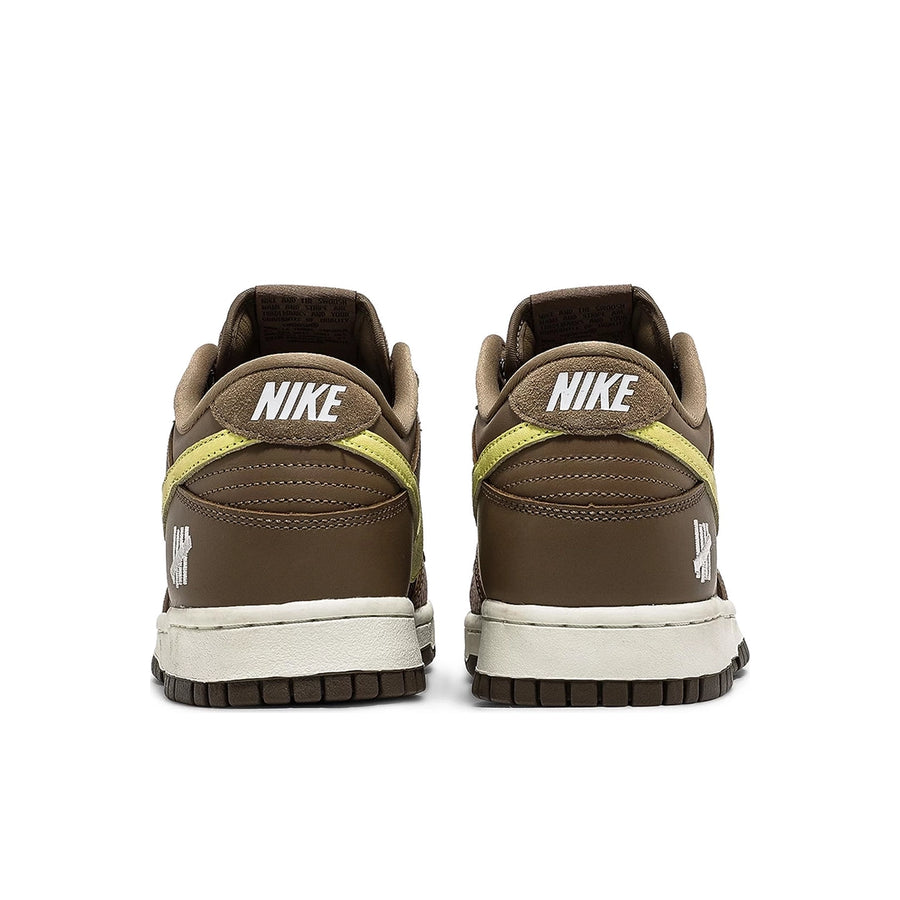 Heel of the Nike dunk low sp undefeated canteen in brown and lemon