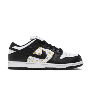 Side of the Nike dunk supreme low skating shoes in a gold stars white black colour