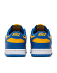 Heel of the Nike dunk low in a yellow blue "ucla" colour