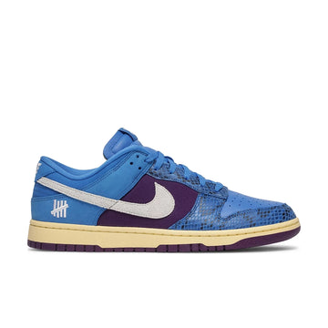 Side of the Nike dunk low undefeated 5 On It in a blue exotic colour