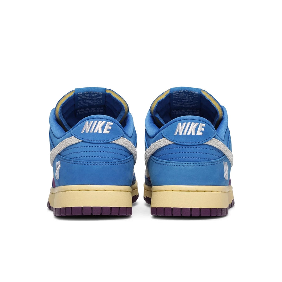 Heel of the Nike dunk low undefeated 5 On It in a blue exotic colour