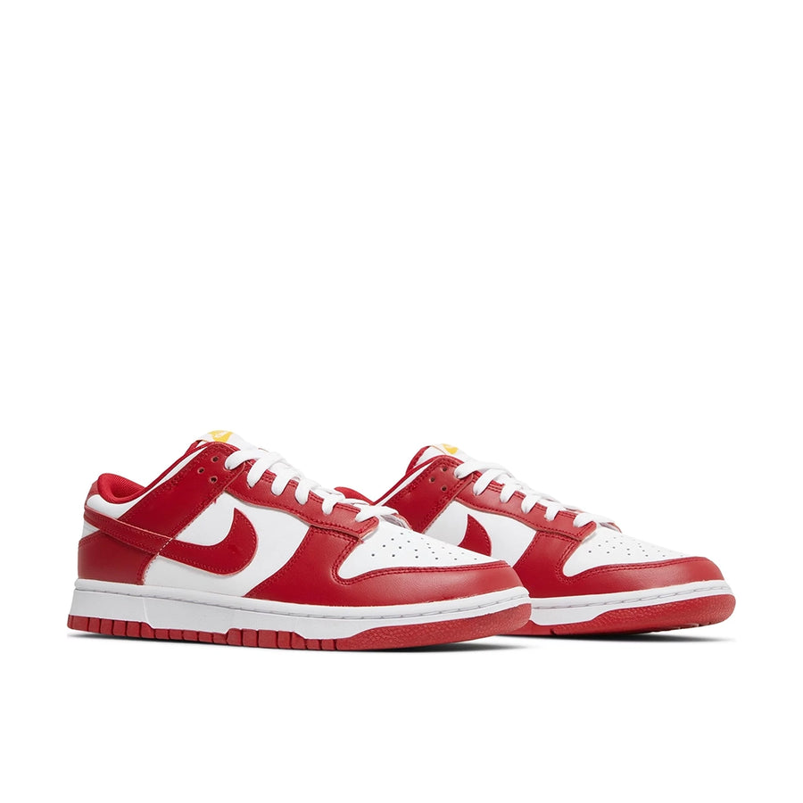 A pair of the Nike dunk lows in a white red "usc" colour