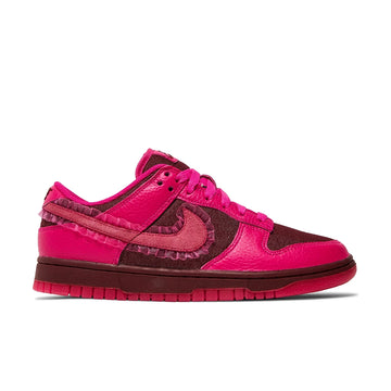 Side of the Nike Dunk Low Valentines Day 2022 womens sneakers in pink and red