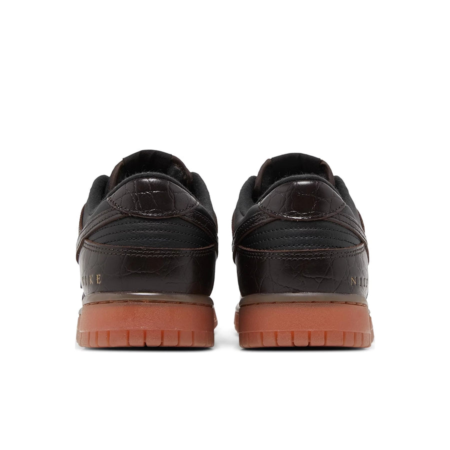 Heels of the Nike Dunk Low Velvet Brown Black mens sneakers in brown