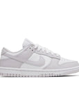 Side of the womens Nike dunk low in a white lilac "venice" colour