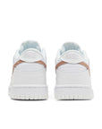Heel of the Nike dunk low grade school sneaker in white and pink