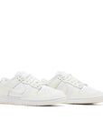 Pair of the Nike Dunk Low Retro (W) Coconut Milk (DD1503-121) in Sail and Coconut Milk White.