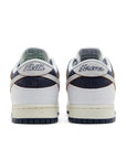 Heels of Nike SB Low HUF New York in navy and white.