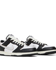 Pair of Nike SB Dunk Low HUF San Francisco in black and white.