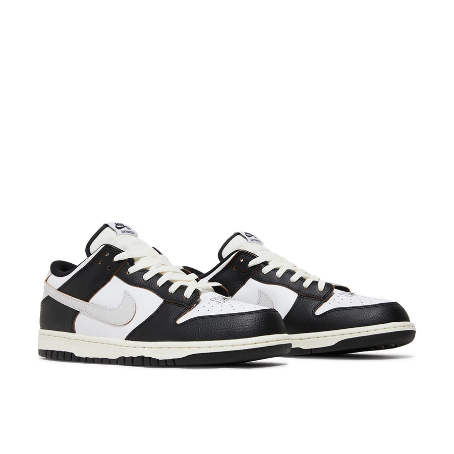 Pair of Nike SB Dunk Low HUF San Francisco in black and white.