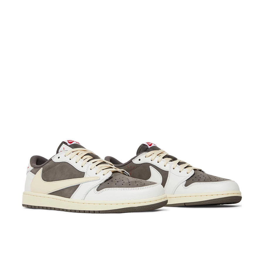 A pair of Nike Air Jordan 1 Low OG SP Travis Scott Reverse Mocha exclusive sneakers in white, mocha and brown