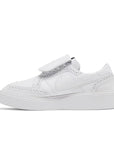 Side of the Nike Kwondo 1 G-Dragon Peaceminusone Triple White sneakers in white