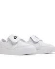 A pair of Nike Kwondo 1 G-Dragon Peaceminusone Triple White sneakers in white