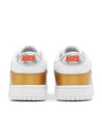 Heel of the Nike SB Dunk Low Heirloom womens shoe in white and gold