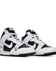 A pair of the Nike sb dunk high supreme skating shoes in white black colour