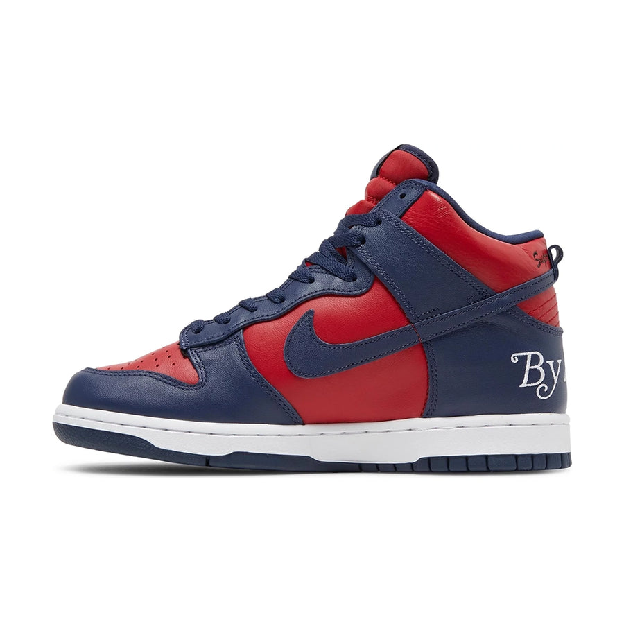 Side of the Nike sb dunk high supreme basketball shoes in red navy colour