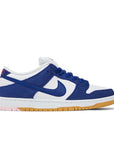 Side of the Nike sb dunk low los angeles dodgers skating shoes in white and blue