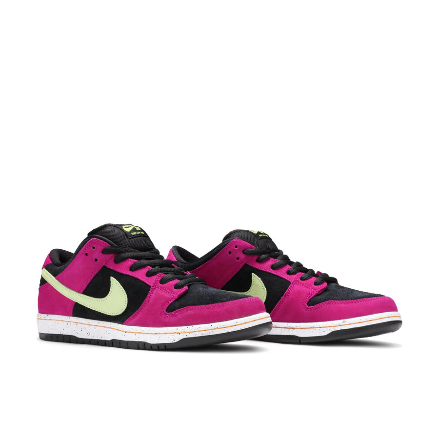 A pair of Nike sb dunk low acg skating shoes in a black and magenta colour