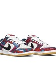 A pair of the Nike sb dunk low pro parra abstract art skating shoes in a pop art and Olympics inspired design