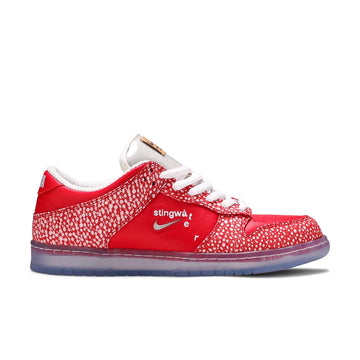 Side of the Nike sb dunk low stingwater magic mushroom skating shoes in red and white
