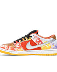 Side of the Nike sb dunk low street hawker skating shoes in a chinese print