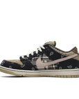 Side of the Nike sb dunk low Travis Scott skating shoes in a white and blue plaid and paisley colour