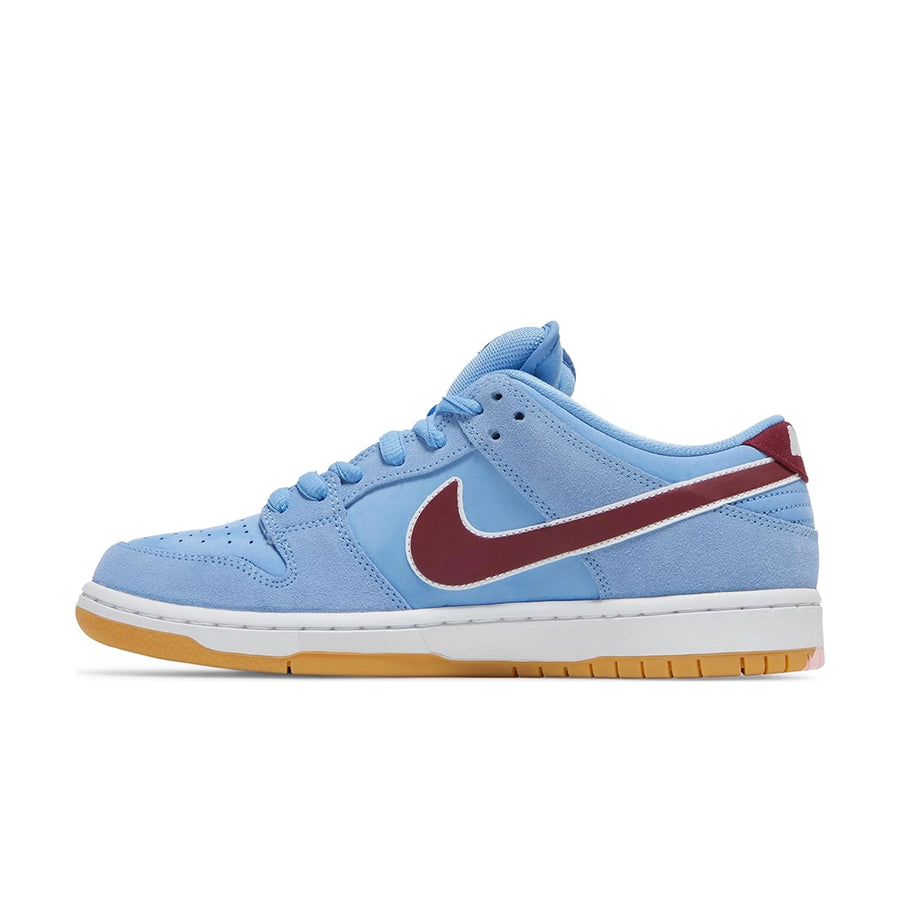 Side of the Nike SB Dunk Low Valour Blue Team Maroon skating shoes in blue and burgundy