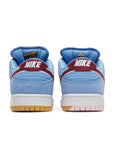 Heel of the Nike SB Dunk Low Valour Blue Team Maroon skating shoes in blue and burgundy